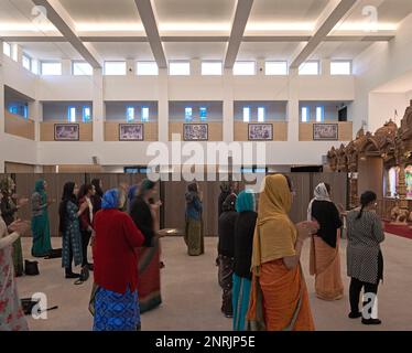 Main prayer hall. Shree Swaminarayan Mandir, Oldham, United Kingdom. Architect: LTS Architects   , 2022. Stock Photo