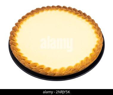 whole cheesecake (sour cream cake) on plate isolated on white background Stock Photo