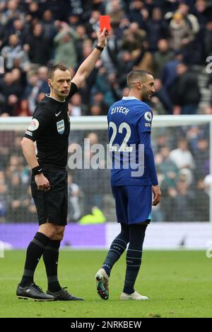 Referee Stuart Attwell shows a red card to Hakim Ziyech of Chelsea which is later rescinded after a VAR review  during the English Premier League socc Stock Photo