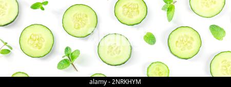 Fresh cucumber and mint on a white background panorama, overhead flat lay shot. Healthy organic food panoramic banner Stock Photo