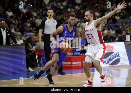 February 26, 2023, Caracas, Caracas/Venezuela, Venezuela: CARACAS, VENEZUELA - FEBRUARY 26: Garly Sojo of Venezuela competes for the ball with Phil Scrubb of Canada during the FIBA ''‹''‹Basketball World Cup 2023 Americas Qualifiers basketball game, Poliedro de Caracas, in Caracas, Venezuela, on February 26, 2023. (Credit Image: © Pedro Rances Mattey/PX Imagens via ZUMA Press Wire) EDITORIAL USAGE ONLY! Not for Commercial USAGE! Stock Photo