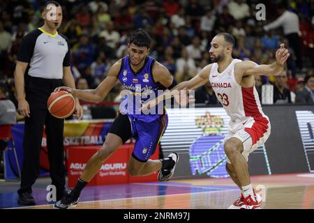 February 26, 2023, Caracas, Caracas/Venezuela, Venezuela: CARACAS, VENEZUELA - FEBRUARY 26: Garly Sojo of Venezuela competes for the ball with Phil Scrubb of Canada during the FIBA ''‹''‹Basketball World Cup 2023 Americas Qualifiers basketball game, Poliedro de Caracas, in Caracas, Venezuela, on February 26, 2023. (Credit Image: © Pedro Rances Mattey/PX Imagens via ZUMA Press Wire) EDITORIAL USAGE ONLY! Not for Commercial USAGE! Stock Photo