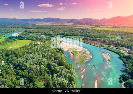 Winding river in the valley on a sunny day. Panoramic view from above of mountain valley. Nature landscape. Tisza river, Zakarpattia Oblast, Ukraine Stock Photo