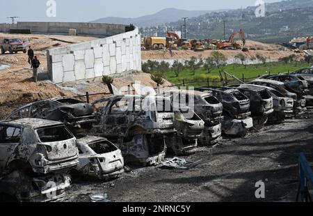 Hawara, Gaza. 27th Feb, 2023. A view of cars burned by Israeli settlers in a revenge attack after two Israeli brothers were killed yesterday by a Palestinian gunman in Hawara, in the West Bank, on Monday, February 27, 2023. Photo by Debbie Hill/ Credit: UPI/Alamy Live News Stock Photo