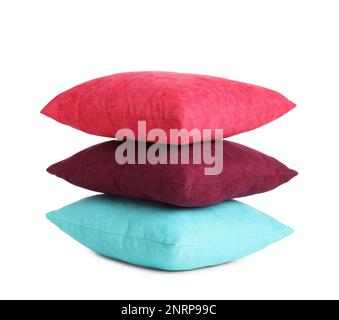 Stack of colorful decorative pillows on white background Stock Photo