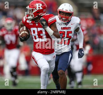 Illinois at Rutgers - 11/14/2020 - Image 15: Nov 14, 2020; Piscataway, New  Jersey, USA; Rutgers Scarlet Knights wide receiver Isaiah Washington (83)  is tackled by Illinois Fighting Illini defensive back Nate