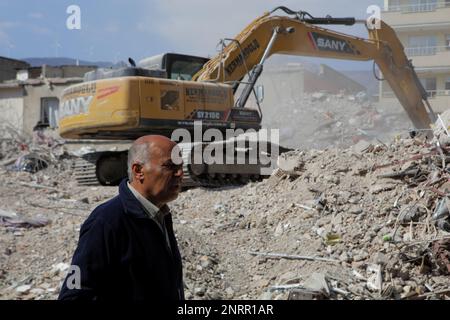 February 26, 2023, NurdagÄ, Gaziantep Province, Turkiye: Gaziantep, Turkiye. 26 February 2023. Heavy machinery clearing the rubble and destruction in the Turkish city of Nurdagi, in the Gaziantep province. Nurdagi has been one of the worst affected cities by the massive earthquake in southern Turkiye along the border with Syria on February 6th. The extreme damage to Nurdagi's buildings, homes, and other infrastructure has prompted the decision by the authorities to consider the demolition of the city (Credit Image: © Muhammed Ibrahim Ali/IMAGESLIVE via ZUMA Press Wire) EDITORIAL USAGE ONLY! No Stock Photo