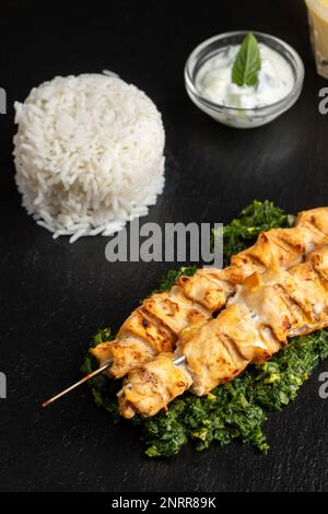 Indian Chicken Skewer With Spinach Stock Photo