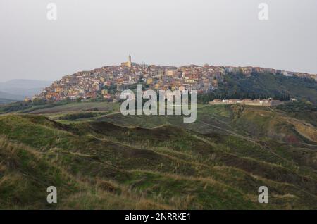 The landslide system with the gullies and in the background Montenero di Bisaccia, a small town in the lower Molise region, Italy Stock Photo