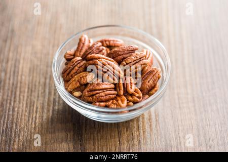 Peeled pecan nuts in the bowl. Stock Photo