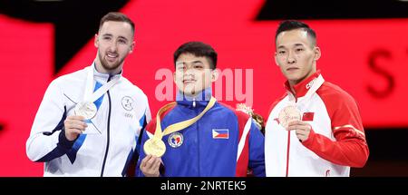 (L-R) Artem Dolgopyat of Israel, silver, Carlos Edriel Yulo of ...