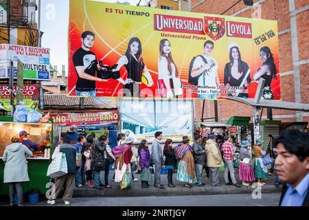 Line of people at the bus stop, in Avenida Mariscal Santa Cruz, La Paz, Bolivia Stock Photo