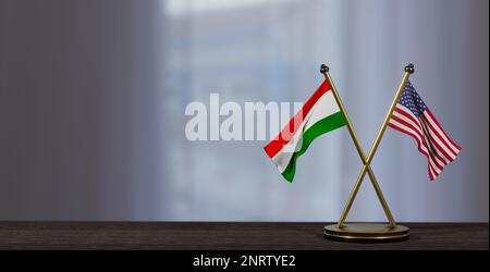 Tajikistan and USA flags on table. Negotiation between Tajikistan and United States. on little blur background. 3D work and 3D image Stock Photo