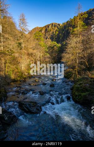 The river Glasyn near Beddgelert North Wales, from Pont Aberglaslyn, on a sunny winters day Stock Photo