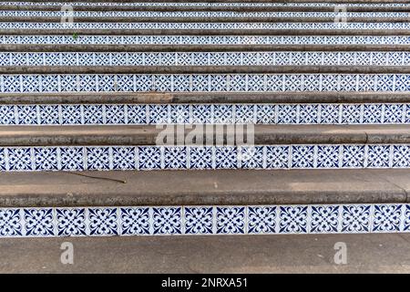 Beautiful detail of vintage mosaic tiles on the stairs leading to Altinho hill in the city of Panjim in Goa. Stock Photo