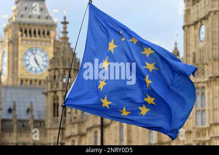 London, UK. 27th Feb, 2023. The European Union flag flies over London with the Houses of Parliament and Big Ben in the background Credit: MARTIN DALTON/Alamy Live News Stock Photo