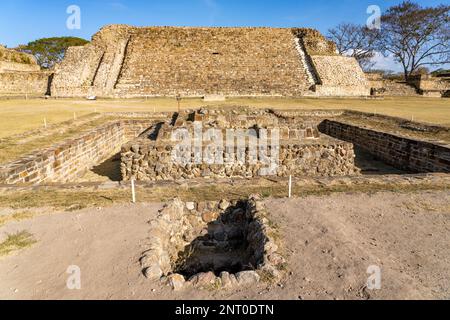 The Adoratorio with the opeing of tunnel in front in the pre-Hispanic Zapotec ruins of Monte Alban in Oaxaca, Mexico.  Building P is in the background Stock Photo