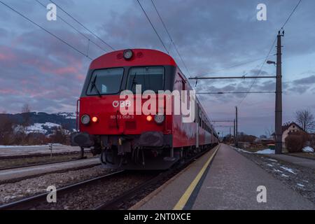 Austria red fast nice passenger trains in Micheldorf station 02 11 2023 Stock Photo