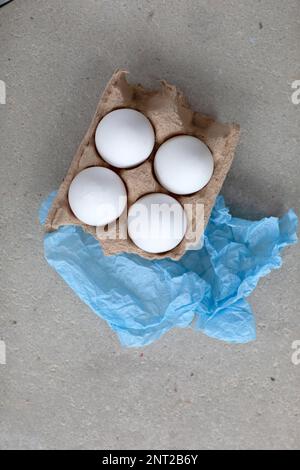 Still Life with Fresh white Eggs in Egg Carton Stock Photo