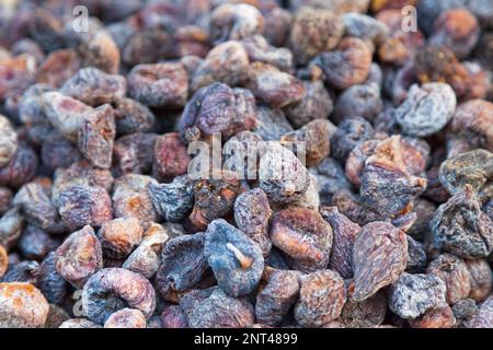 Close-up on a stack of dried figs for sale in the souk of Marrakesh in Morocco. Stock Photo