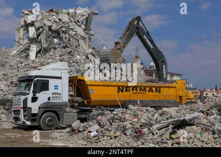 February 26, 2023, NurdagÄ, Gaziantep Province, Turkiye: Gaziantep, Turkiye. 26 February 2023. Heavy machinery clearing the rubble and destruction in the Turkish city of Nurdagi, in the Gaziantep province. Nurdagi has been one of the worst affected cities by the massive earthquake in southern Turkiye along the border with Syria on February 6th. The extreme damage to Nurdagi's buildings, homes, and other infrastructure has prompted the decision by the authorities to consider the demolition of the city (Credit Image: © Muhammed Ibrahim Ali/IMAGESLIVE via ZUMA Press Wire) EDITORIAL USAGE ONLY! No Stock Photo