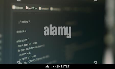 Computer monitor with developing programming and coding technology to create new user interface app in it agency office. Database code to check algorithm and plan security system. Close up. Stock Photo