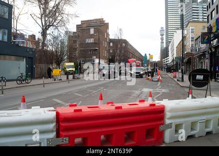 Euston, London, UK. 27th February, 2023. HS2 Ltd are doing vast amounts of construction for the new High Speed Rail 2 London Euston railway station terminus and London Underground interchange. HS2 started utility diversions in the Euston Road last week which is now slowing down traffic. Residents living in the Euston area are having to endure HS2 noise, dust and disruption that one resident  described today as 'hell on earth with no end in sight'. Credit: Maureen McLean/Alamy Live News Stock Photo