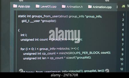 Display of software developer typing database functions script on html terminal window in it agency office. Computer showing programer writing source code and developing app. Close up. Stock Photo