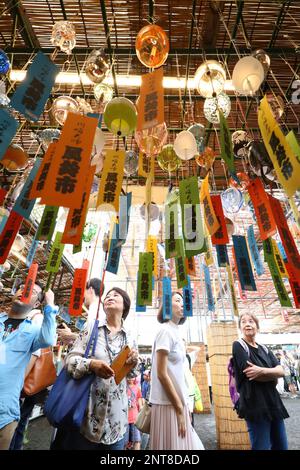 People enjoy watching wind-bells during Furin-Ichi, wind