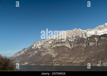 Unterterzen, Canton Saint Gallen, Switzerland, February 10, 2023 Incredible view over the Alpstein mountains and the lake of Walensee Stock Photo