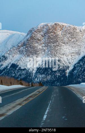 Incredible winter mountain views along the Alaska Highway during January with incredible towering landscape views. Stock Photo