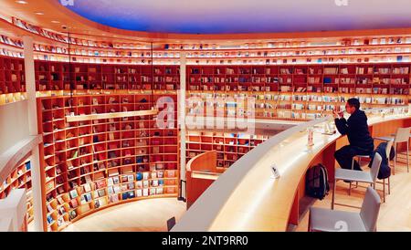 SHANGHAI, CHINA - FEBRUARY 24, 2023 - (FILE) People visit the Xinhua bookstore 'Light Space' designed by Japanese architect Tadao Ando in Shanghai, Ch Stock Photo