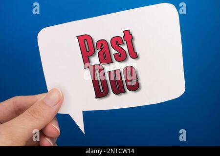 Speech bubble in front of colored background with Past Due text. Stock Photo