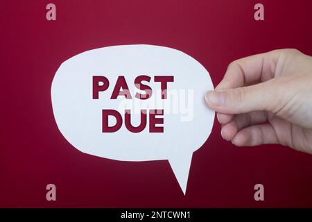 Speech bubble in front of colored background with Past Due text. Stock Photo