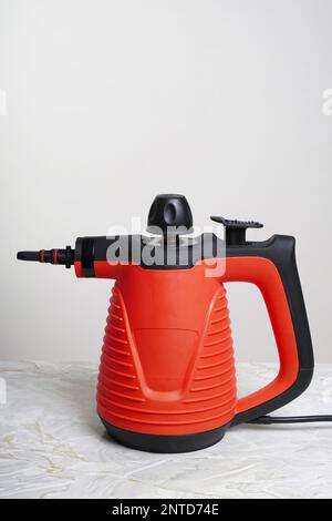 handheld vapor steam cleaner Stock Photo - Alamy