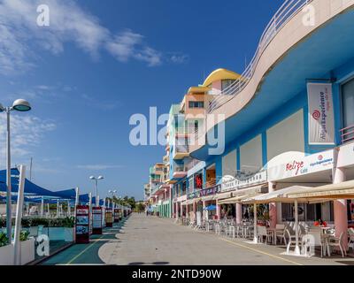 ALBUFEIRA, SOUTHERN ALGARVE/PORTUGAL - MARCH 10 : Colourful Buildings at the Marina in Albufeira Portugal on March 10, 2018. Unidentified people Stock Photo