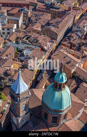 View from the Asinelli Tower of the towers of the churches of Santi Bartolomeo and Gaetano, Old Town, Bologna, Emilia-Romagna, Italy Stock Photo