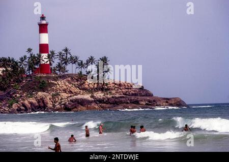 Kovalam, stretches of golden sand beach, fringed by coconut palms, very close to capital city Thiruvananthapuram, Kerala, India, Asia Stock Photo