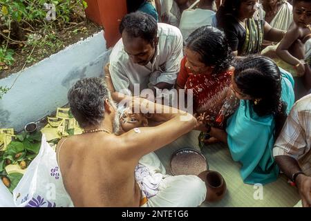 Ezhuthiniruthu Ceremony on Vijayadasami day in Saraswathi Temple at Panachikadu near Kottayam, Kerala, South India, India, Asia Stock Photo