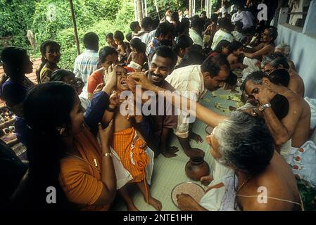 Ezhuthiniruthu Ceremony on Vijayadasami day in Saraswathi Temple at Panachikadu near Kottayam, Kerala, South India, India, Asia Stock Photo