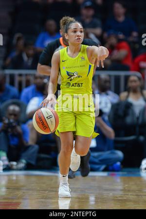 ATLANTA, GA – MAY 24: Dallas head coach Brian Agler (left) gathers his team  together in a time-out during the WNBA game between the Atlanta Dream and  the Dallas Wings on May