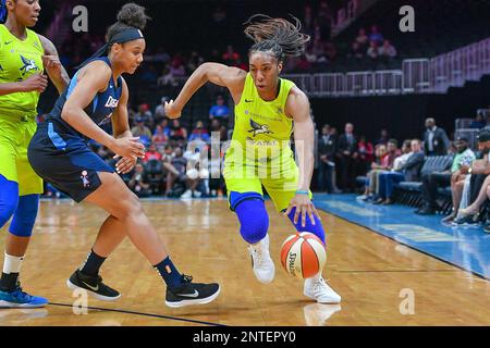 ATLANTA, GA – MAY 24: Dallas head coach Brian Agler (left) gathers his team  together in a time-out during the WNBA game between the Atlanta Dream and  the Dallas Wings on May