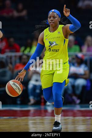 ATLANTA, GA – MAY 24: Dallas head coach Brian Agler (left) gathers his team  together in a time-out during the WNBA game between the Atlanta Dream and  the Dallas Wings on May