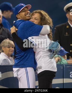 Adlin Auffant, mother of Toronto Blue Jays pitcher Marcus Stroman, throws  out the ceremonial first pitch prior to a baseball game against the Chicago  White Sox in Toronto, Sunday, May 12, 2019. (