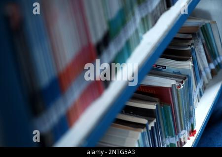 Rows Of Learning Books Arranged On Shelves, In The School Library Room Stock Photo