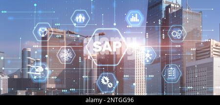 SAP - Business process automation software and management software on city background. Stock Photo
