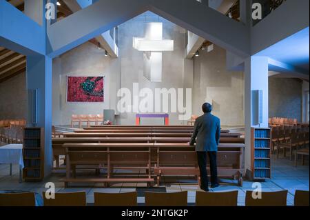 PRODUCTION - 24 February 2023, Saxony-Anhalt, Halle (Saale): Catholic priest Magnus Koschig stands in Halle's Heilig Kreuz church. The 62-year-old assumes that in just ten years there will be only 20 priests in the Magdburg diocese instead of the current 55 due to aging. (to dpa 'Fewer priests, more laity: Catholic diocese in transition') Photo: Heiko Rebsch/dpa Stock Photo