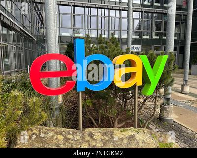 Kleinmachnow, Germany. 27th Feb, 2023. The logo of the digital marketplace Ebay in front of the Germany headquarters in Kleinmachnow near Berlin. Ebay will stop charging private sellers in Germany from March 1, 2023, in a bid to boost business on the platform overall. Credit: Christoph Dernbach/dpa/Alamy Live News Stock Photo