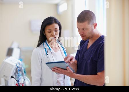 Using modern technology to do some medical research. a doctor working in a hospital. Stock Photo