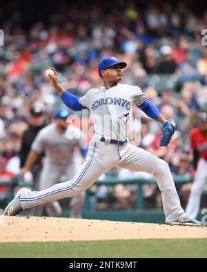 Toronto Blue Jays pitchers Marcus Stroman, right, and Pat Venditte trade  gloves in the first official workout of spring training in Dunedin, Fla.,  on Monday February 22, 2016. Venditte, who is ambidextrous